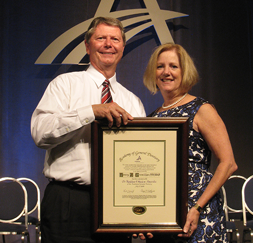 the Gremillions with the Academy of General Dentistry award